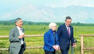 Governor of the Bank of Japan Haruhiko Kuroda, United States Federal Reserve Chair Janet Yellen and President of the European Central Bank Mario Draghi walk after posing for a photo opportunity during the annual central bank research conference in Jackson