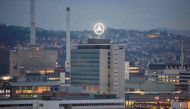 (FILES) This file photo taken on February 01, 2017 shows the Mercedes star on the headquarters of Daimler AG in Stuttgart, southwestern Germany.  AFP / THOMAS KIENZLE
