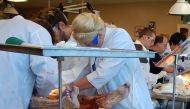 REPRESENTATIVE IMAGE: Volunteers at the University of Indiana prepare cadavers for the incoming class of medical students, in Gary, Indiana, August 5, 2010. Reuters/James Kelleher