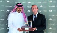 Qatar Airways Cargo presented a memento of appreciation to the Executive Director of Al Shaqab (a member of Qatar Foundation), Khalifa Al Attiya.
