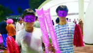 Families participate in Qatar Foundation’s breast cancer awareness walk in Oxygen Park, Education City.