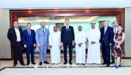 Sheikh Faisal bin Qasim Al Thani (fourth left), QBA Chairman; Ilan Laufer (fourth right), Romanian Minister for Business Environment, Commerce and Entrepreneurship; and Dr Cristian Tudor (third left) Ambassador of the Republic of Romania to Qatar along wi