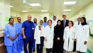 Minister of Public Health, H E Dr Hanan Mohamed Al Kuwari, with the transplant team.
