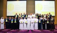 The winners of Qatar Sustainability Awards with officials during the ceremony. 