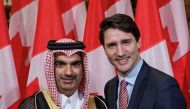 (file Photo)  Qatar's Ambassador to Canada Fahad Mohammed Yusuf Kafood and Canada's Prime Minister Justin Trudeau