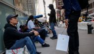 Customers wait in line for the new iPhone X, which goes on sale on November 3, outside an Apple store in New York City, U.S., November 2, 2017. Reuters/Brendan McDermid