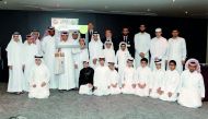 Winners of Al Wakrah-Unesco competition for green sustainability pose with officials. 