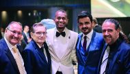 The President of Qatar Olympic Committee (QOC)  H E Sheikh Joaan bin Hamad Al Thani and star Qatari high jumper Mutaz Barshim (centre) pose for a group picture along with other officials, after the National Olympic Committee (ANOC) Awards Ceremony in Prag