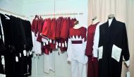 Qatari Flag coloured garments at 12th Heya Arabian Fashion Exhibition which is taking place at DECC. Pic: Baher Amin / The Peninsula