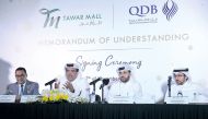 Chairman of Tawar Mall,  Jassim  Jabor Sultan Tawar Al Kuwari (second left ) Qatar Development Bank CEO Abdulaziz bin Nasser Al  Khalifa (second right), and other officials  at the signing event at Tawar Mall. Pic: Kammutty VP / The Peninsula