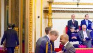 Sultan Choudhury (right) being made an OBE by Prince William, Duke of Cambridge at Buckingham Palace.