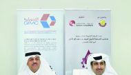 Qatar Chamber Director General, Saleh bin Hamad Al Sharqi, and QIMC’s CEO, Abdul Rahman Abdulla Al Ansari, sign the sponsorship agreement at Qatar Chamber yesterday.

