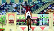 Qatari rider Sheikh Ali bin Khalid Al Thani celebrates on First Devision during the 160cm class - part of the FEI World Cup qualifying leg on day-three of the QNB Qatar International Show Jumping Championship at QEF’s Outdoor Arena yesterday. (Pic: Pictur