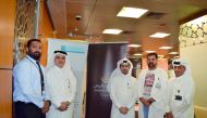 Officials and other representatives during the blood donation campaign organised by Masraf Al Rayan in collaboration with the Blood Donation Unit at Hamad Medical Corporation  at the bank’s head office, yesterday. 