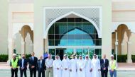 Officials pose for a group picture at the handing over ceremony.