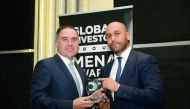 Francesco Grosoli (left), Barclays’ Head of the Private Bank for Europe, the Middle East and Africa (EMEA) receiving the award on behalf of Barclays