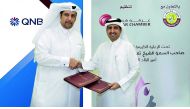 Saleh bin Hamad Al Sharqi (right), Director-General, Qatar Chamber; and Salim Anzan Al Nuaimi, QNB’s Assistant General Manager for Communication, shake hands after signing the sponsorship agreement at Qatar Chamber headquarters, yesterday.