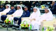 Minister of Education and Higher Education, H E Dr Mohammed Abdul Wahed Ali Al Hammadi (second right) and Director-General of Public Security, Staff Major General Saad bin Jassim Al Khulaifi (third right) with other officials from the two ministries durin