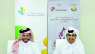 Saleh bin Hamad Al Sharqi, Director-General at QC, and Hassad’s CEO, Mohamed bin Badr Al Sadah, sign the sponsorship agreement at the QC venue yesterday.
