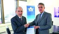 Qatar Airways Group Chief Executive Akbar Al Baker receiving the IEnvA Stage 2 certificate from Alexandre de Juniac, Director-General and Chief Executive Officer of IATA, in Geneva.