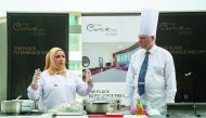 Chef Aisha Al Tamimi and Ambassador Dr Axel Wabenhorst during the cooking event.