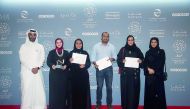 Chief Administrative Officer of Doha Film Institute Abdulla Jassim Al Mosallam (left), CEO of Doha Film Institute Fatma Al Remaihi (right) with award winners Nada Bedair, Rawda Al Thani, Nibu Vasudevan and Amal Al Muftah at the award ceremony during the A