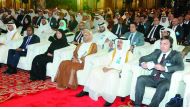 Minister of Administrative Development, Labour and Social Affairs H E Dr Issa bin Saad Al Jafali Al Nuaimi (extreme left) and H E Minister of Public Health Dr Hanan Mohamed Al Kuwari (third left) during the 5th Interpol Global Conference on Trafficking in