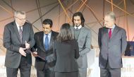 H H Sheikh Jassim bin Hamad Al Thani (second right), Special Representative of H H the Emir; honours a winner of Sheikh Tamim International Anti-Corruption Award 2017 in the presence of Attorney General H E Dr Ali bin Fetais Al Marri (second left) and oth