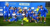 Aspire Academy players and officials celebrates during the prize distribution ceremony after winning the Tri-Series football tournament in Doha.