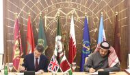 DOHA, QATAR - DECEMBER 10: Defence Secretary of United Kingdom, Gavin Williamson (L) and Minister of State for Defense of Qatar Khalid bin Mohammad Al Attiyah (R) sign an agreement on the sale of Eurofighter Typhoon type jet fighters to Qatar after a meet