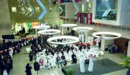 Performers entertaining audience during the Qatar National Day celebrations at Georgetown University in Qatar.