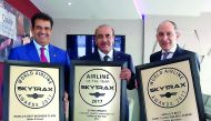 Qatar Airways Group Chief Executive Akbar Al Baker (right) holding Skytrax Airline of the Year award with other officials at Paris Air Show in June.