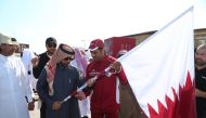 Katara General Manager Dr. Khalid bin Ibrahim Al Sulaiti with World Archery Champion, Abdelaziz Saleh Al-Attiyah. 