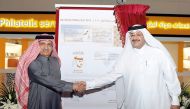 Officials launching Qatar National Day 2017 Stamp at a function in Doha yesterday. Pic: Salim Matramkot/ The Peninsula
