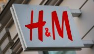 The logo of Swedish fashion lebel H&M is seen outside a store in Vienna, Austria. REUTERS/Leonhard Foeger/ File photo