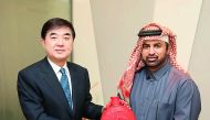 Katara General Manager, Dr. Khalid bin Ibrahim Al Sulaiti, presenting a souvenir to Chinese Ambassador Li Chen, yesterday. 