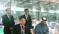 Mohammed bin Ahmed bin Towar (right), Vice-President of Qatar Chamber; and Ian Yarinov, President of the International Chamber of Kazakhstan sign the cooperation deal on the sidelines of ‘Made in Qatar’ expo, at Doha Exhibition and Convention Center.