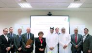 Faisal Al Sahouti (sixth left), QICDRC CEO;  and Professor Dr Nayla Comair Obeid (fifth left) CIArb President 2017, with officials of QICDRC and CIArb during the MoU signing event.