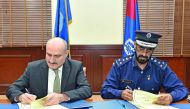Director-General of the Police College Brigadier Mohammed Abdullah Al Muhana Al Marri and the President of the Academy Dr Yilmaz Shulat at the signing event.
