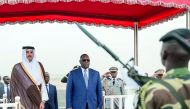 Emir H H Sheikh Tamim bin Hamad Al Thani receiving the guard of honour upon his arrival in Dakar, Senegal, yesterday.