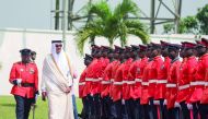 Emir H H Sheikh Tamim bin Hamad Al Thani reviewing the Guard of Honor in Accra yesterday. 