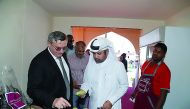 Katara General Manager Dr. Khalid bin Ibrahim Al Sulaiti briefs  an Ambassador on various local products available at Mahaseel Festival. 
