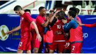 Qatari players celebrate a goal against Iraq during their Gulf Cup game on Tuesday in Kuwait City. Picture: Hussein Sayed
