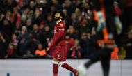 Liverpool's Egyptian midfielder Mohamed Salah celebrates scoring the team's second goal during the English Premier League football match between Liverpool and Leicester at Anfield in Liverpool, north west England on December 30, 2017.  AFP / Paul ELLIS 
