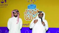 Poet Hamed Al Baridi and poet and writer Radhi Al Hajri at the charity bazaar held at Aspire Zone Park. 