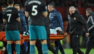 Manchester United's Belgian striker Romelu Lukaku is taken off on a stretcher after appearing to pick up a head injury during the English Premier League football match between Manchester United and Southampton at Old Trafford in Manchester, north west Eng