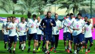 Fans watching Bayern Munich’s training session at Aspire in Doha yesterday. Right: Bayern Munich players during training. Pic: Salim Matramkot/The Peninsula
