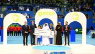 Officials with children during the cheque handing over ceremony.