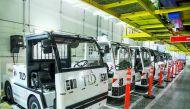 Electric vehicles deployed by Qatar Airways at airport. 