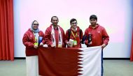Qatar team members pose for a photograph at Huawei ICT Skill Competition Middle East. 